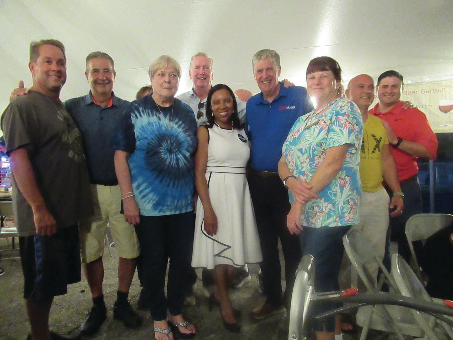 FESTIVAL FUN: Gov. Dan McKee, Lt. Gov. Sabina Matos, Cranston Mayor Ken Hopkins, Sen. Frank Lombardo and Councilwoman Linda Folcarelli, Dave Pingitore, Marty Church and Richard DelFino III are among the hundreds of took in the fun and food-filled record-setting St. Rocco’s Feast and Festival last Friday night in Johnston.